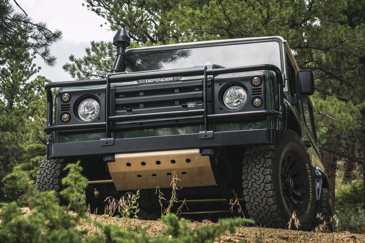 Land Rover Defender, front detail on a mountain trail